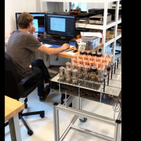 Sebastian working on the burn-in machine